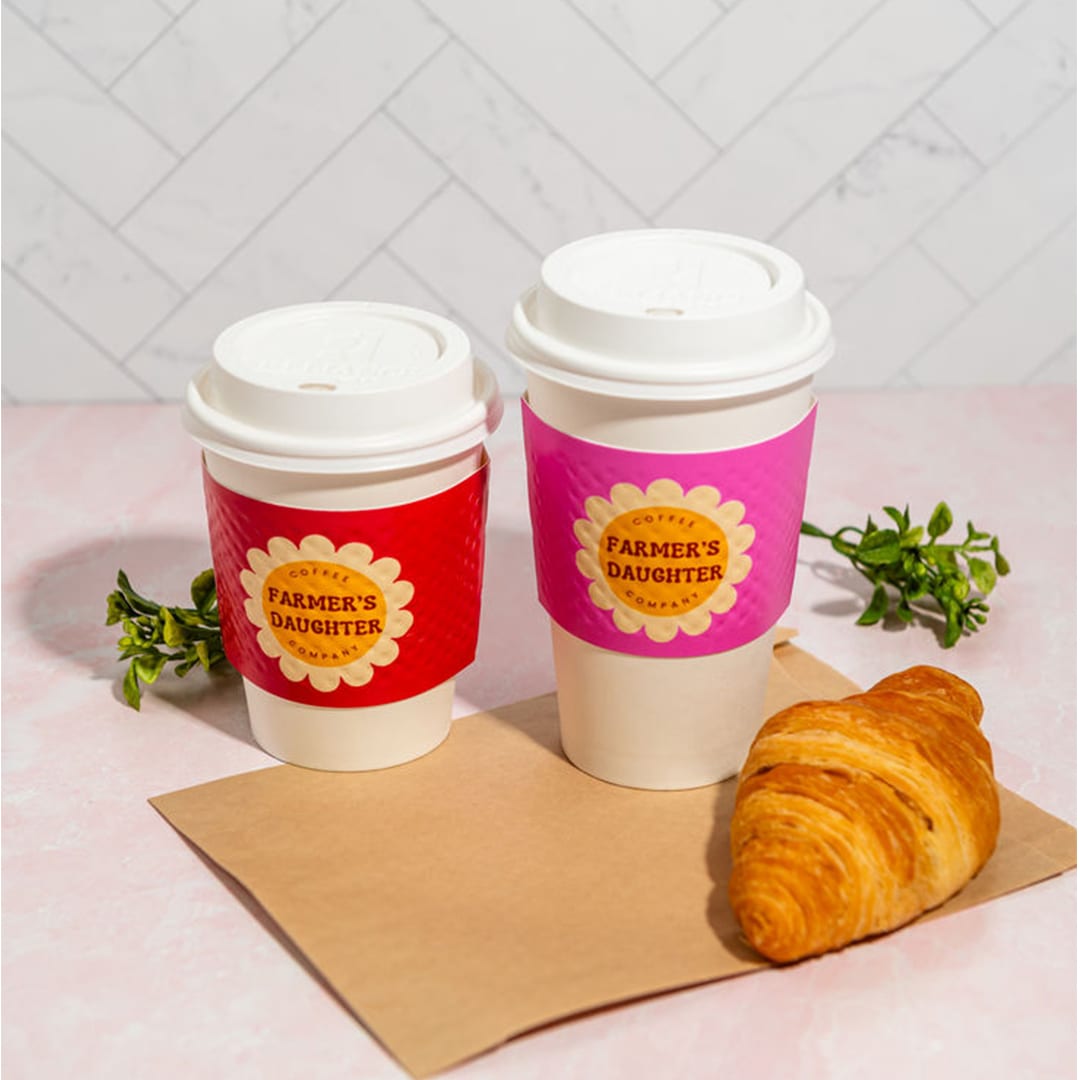 Coffee cups with Holiday Coffee Sleeves