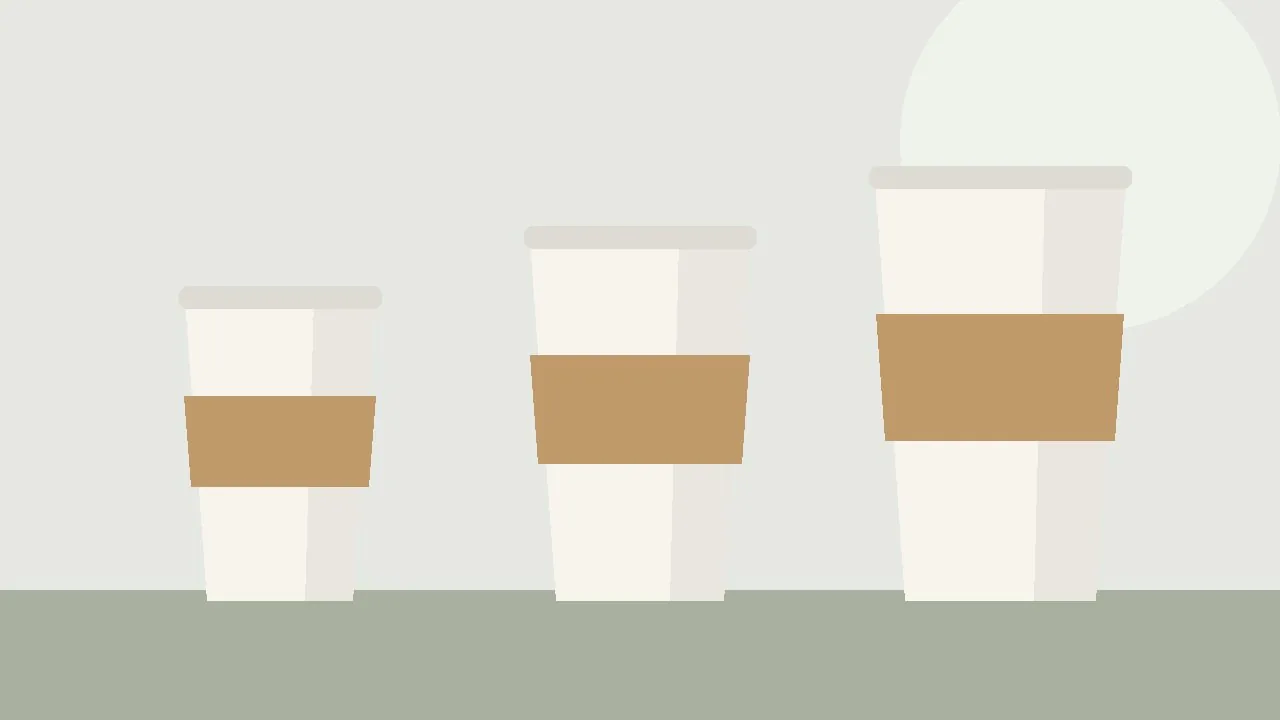 Three takeaway cups in fitted sleeves arranged from small to large
